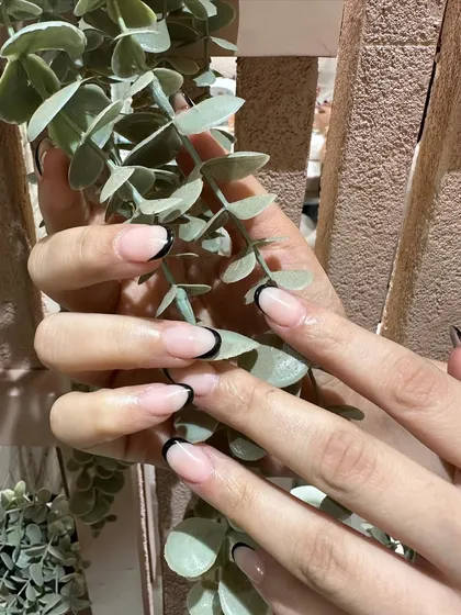 A classic French manicure gets an edgy update with a sharp, black tip. This look is perfect for Valentine's month or any time you want to feel bold.