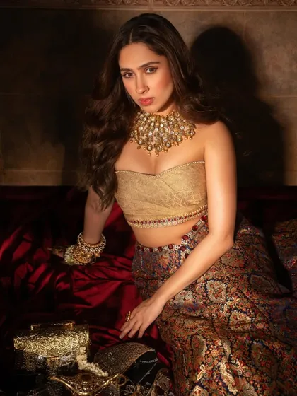 Pashmina Roshan in a moment of quiet elegance, her traditional attire elevated by our handcrafted polki choker and stacked bangles.