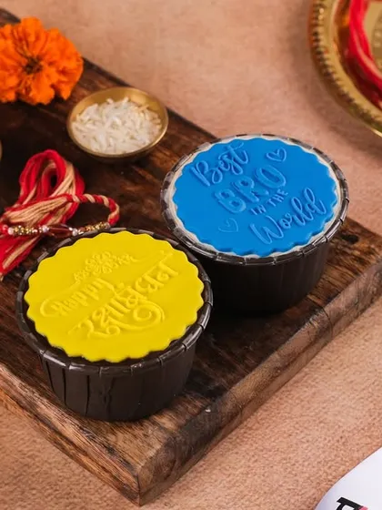 More of our custom Rakhi cupcakes, with "Happy Rakhi" and "Best Bro in the World" toppers. A perfect treat for your sibling.