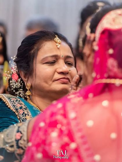 A mother's emotional expression during her daughter's Bidai. Capturing the feelings of the family is a key part of telling the whole wedding story.