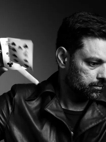 A black and white portrait from a fun, impromptu photoshoot. It captures the serious, artistic side of my magic.
