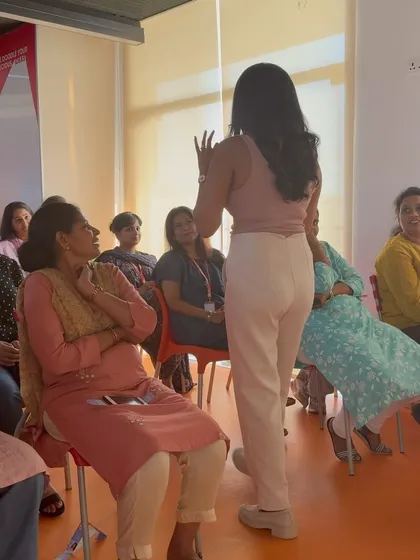 My corporate workshops are interactive and practical. Here, I was guiding a discussion on how to keep moving safely and effectively during menstruation. I focus on providing real takeaways that your team can use in their everyday lives.