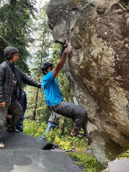 Working through the initial moves of a bouldering problem in the beautiful forests of Sethan. Every outdoor trip is a chance to connect with nature and test your skills.