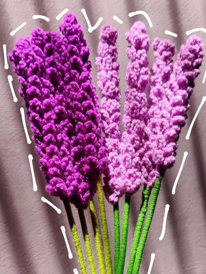 A mix of lilac and purple lavender stems held together, with a heart-shaped graphic outline.