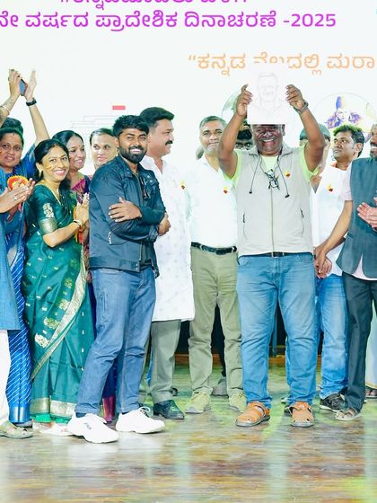 A group photo on stage after presenting sketches at a Kannada event. The sense of community and shared love for our language and art is always inspiring.
