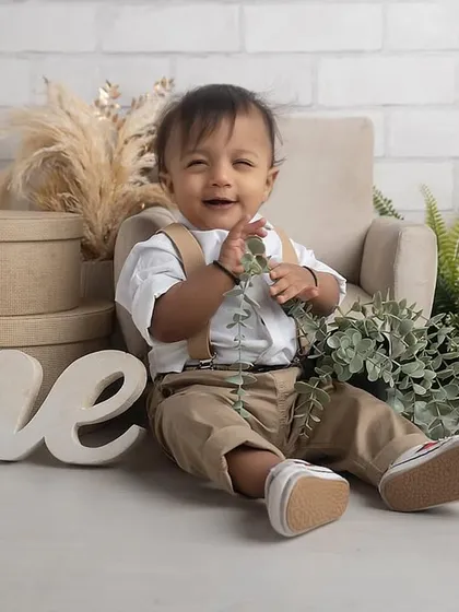 Pure joy and excitement! Capturing these priceless expressions is what makes milestone photography so special.