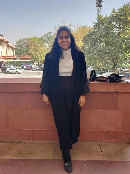 A full-length shot of my court attire. Professionalism and preparation are key in the legal field.