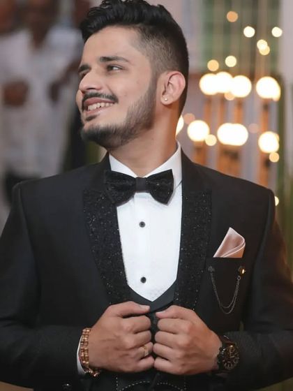 A closer look at the lapel work on this custom tuxedo. The texture and shine are designed to make the groom's outfit unique.