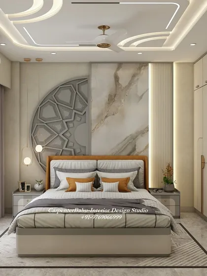 A luxurious bedroom with a large geometric art piece on the headboard wall. The combination of marble, wood, and metal finishes creates a rich and sophisticated look.