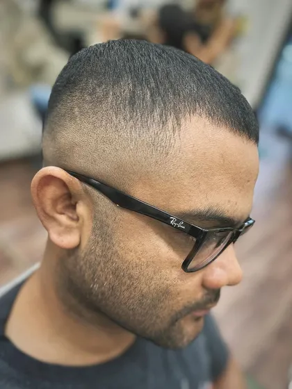 Another angle of the skin fade crew cut, showing the seamless blend from the top down. This cut is clean, low-maintenance, and requires precise clipper work to get right.
