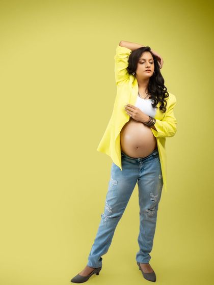 Bold, confident, timeless. This shot breaks stereotypes and creates something that speaks of strength and style with a yellow blazer and distressed denim.