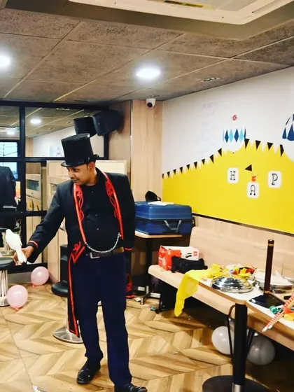 Getting ready to perform the appearing dove trick at a party. The setup is simple, but the result is always pure magic.