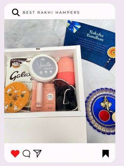 The 'Rakshabandhan Box' for a sister, filled with pampering items. This white box includes vanilla body butter, lip balm, a makeup blender, and of course, some chocolate.