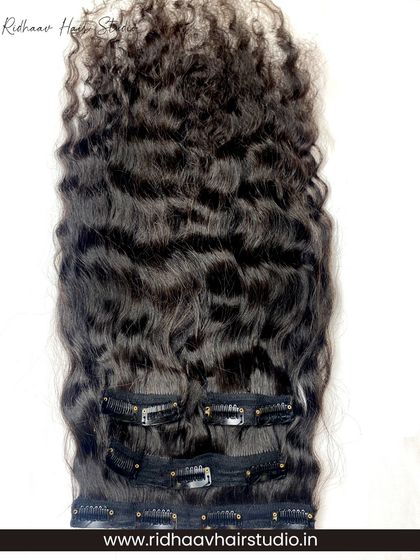 Get instant, bouncy curls with our 4-piece premium curly clip-in hair extensions. This set is perfect for adding volume and texture for a glamorous, full-bodied look.