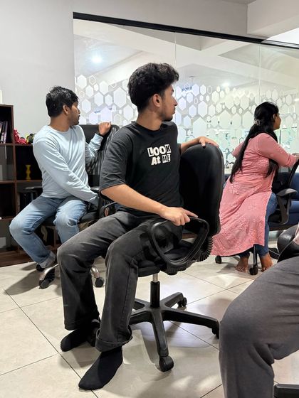 Hamsa Yoga - Corporate Yoga & Wellness Programs Desk-Side Rejuvenation: Chair Yoga photo 12