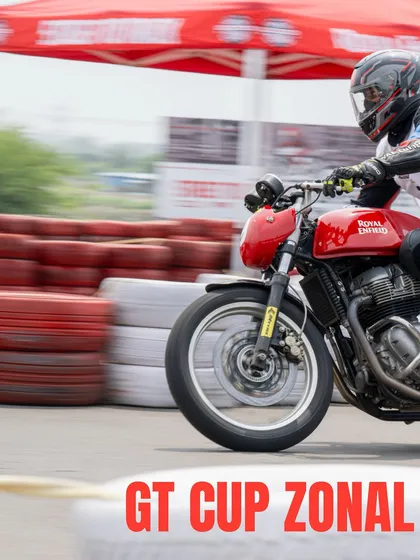 A motion-blur shot from the RE GT Cup Zonal Selection in Pune, capturing the speed and dynamism of the event.