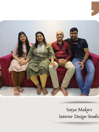 With a smiling family after completing their home interiors in Borivali.