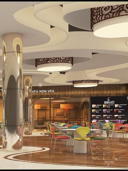 Another perspective of the food court at LP Walk Mall, showing the reflective pillars and custom light fixtures. The layout is designed to be open and easy to navigate while accommodating multiple food vendors.