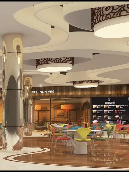 Another perspective of the food court at LP Walk Mall, showing the reflective pillars and custom light fixtures. The layout is designed to be open and easy to navigate while accommodating multiple food vendors.