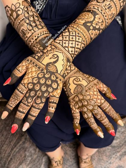 A slightly different angle of the stunning peacock bridal design.