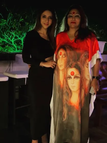 Another photo of my mother in the custom-painted kaftan I designed for her. She wears it so beautifully.