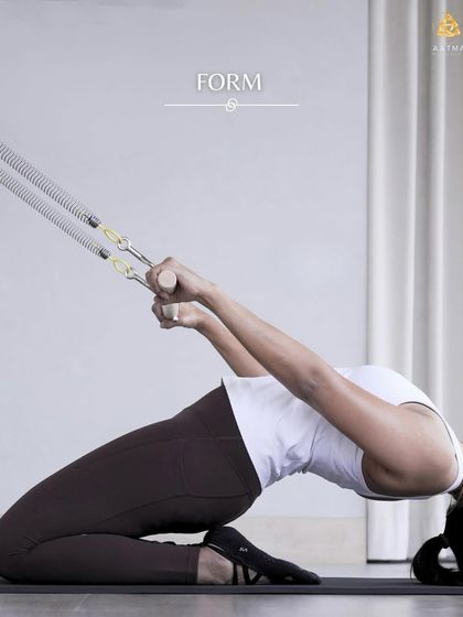 Perfecting the form of this kneeling stretch on the springboard. This movement opens up the chest and shoulders while challenging core stability.