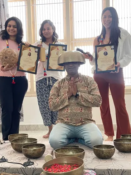 A playful moment with our graduates, who are now ready to spread the healing power of sound.