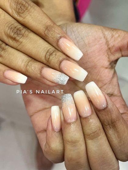 My top recommendation for confused brides. A classic French ombre or "baby boomer" nail is timeless and goes with every single outfit. We added a touch of silver glitter on the accent nail for a little extra sparkle.