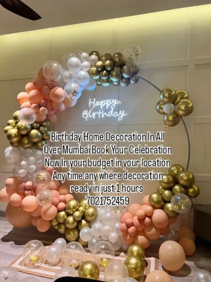 An elegant home decoration featuring a balloon ring in peach, white, and gold. The neon sign adds a modern touch, and the whole setup is ready in just one hour for your convenience.