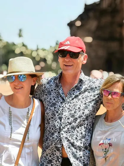 A group portrait of tourists, captured with the Oppo Reno 11 Series. This shows the phone's ability to handle group shots, keeping multiple subjects in focus and well-exposed under bright sunlight.