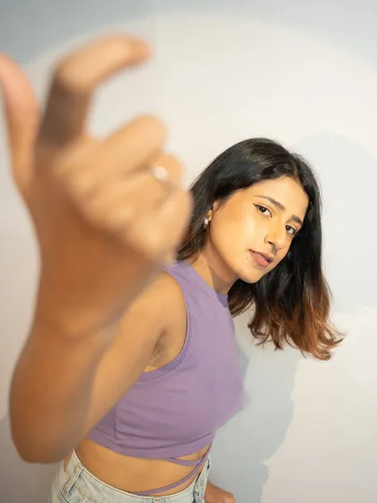 A playful, confident pose.