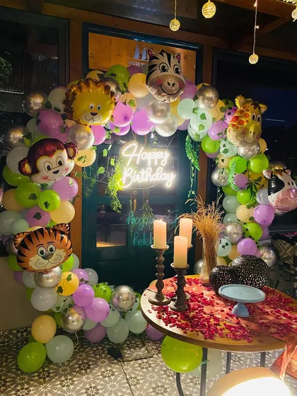 Another angle of the jungle animal party decor, perfect for a toddler's birthday.