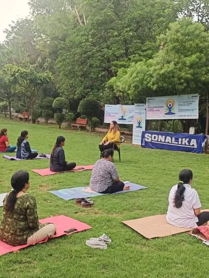 A smaller group session held outdoors, sponsored by a local partner. We collaborate with organizations to bring the benefits of yoga to a wider audience.
