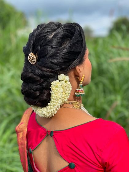 Another angle of this beautiful guest hairstyle, showing the detail and precision of the braid work.