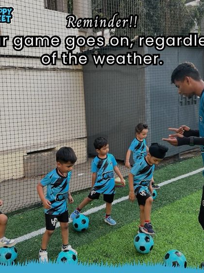 A little rain can't stop us! Our coach reminds the team that the game goes on. Here, the kids are practicing their footwork, learning to balance on the ball, which is a great activity for building core strength and stability.