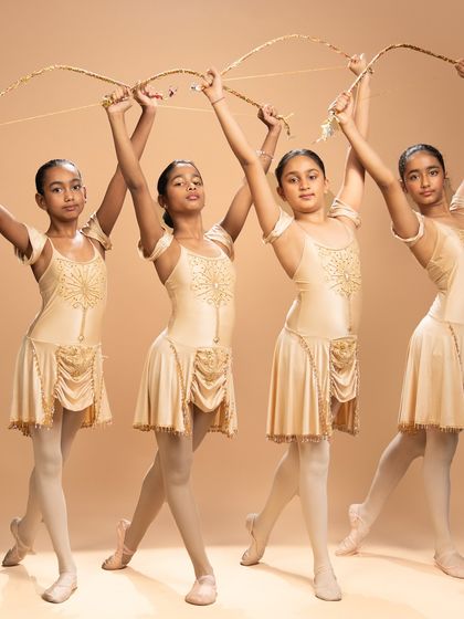These studio portraits capture the warrior spirit of our dancers performing a piece inspired by the ballet 'Sylvia.' Holding their bows, they embody a story of conflict, courage, and resolution.