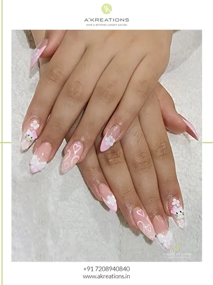 Another angle of the Hello Kitty nail art, showing the detail on each nail. This kind of character art is a fun way to express your personality and is great for all ages.
