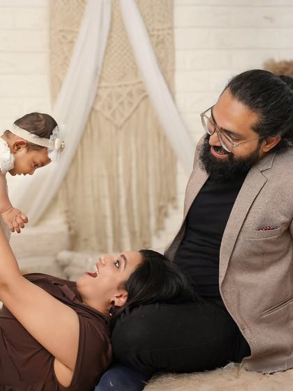 A beautiful family lost in a moment of love. The way these new parents look at their baby is pure magic, and I feel so lucky to capture it.