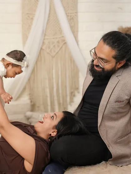 A beautiful family lost in a moment of love. The way these new parents look at their baby is pure magic, and I feel so lucky to capture it.