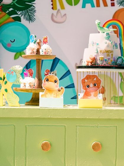 The dessert table was filled with adorable dinosaur-themed treats and a beautiful cake, making it a sweet highlight of the party.