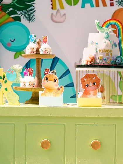 The dessert table was filled with adorable dinosaur-themed treats and a beautiful cake, making it a sweet highlight of the party.