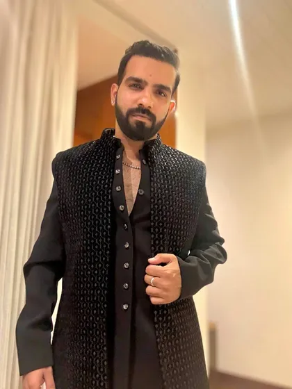 Rocking a traditional look for a wedding in Delhi. I believe in matching my style to the event's vibe, whether it's with my outfit or my music.