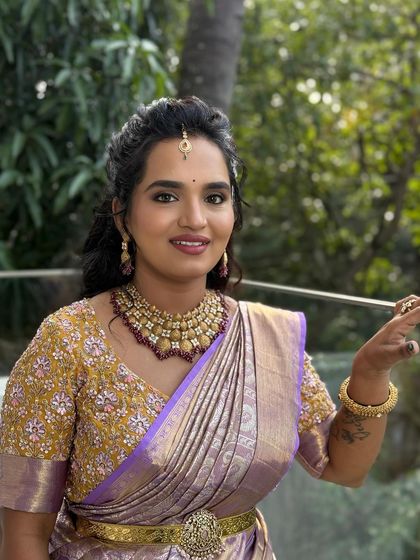 Another shot of this beautiful party makeup look. The soft curls and glowing skin are a perfect combination.