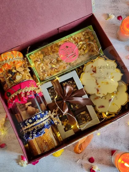This is what my festive gifting is all about. This packed Diwali hamper includes a bit of everything: nutty tea cakes, assorted chocolates, and other handmade treats, all beautifully boxed up.