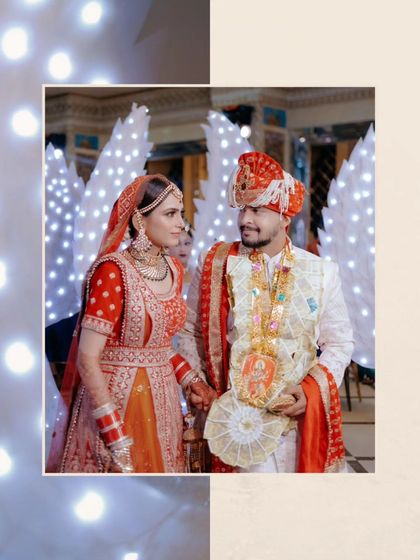 An artistic shot of the couple, framed by glowing angel wings, creating a magical and ethereal wedding portrait.
