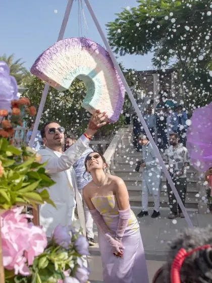 A piñata moment for the couple at the carnival. I incorporate playful activities and games that allow the couple and their guests to relax and have fun together.