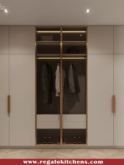 A minimalist wardrobe with a central open-faced section framed in a warm wood tone. This design is perfect for displaying favorite items while keeping the rest neatly tucked away.