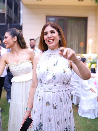 A candid shot from a family function. It’s all about finding outfits that let you enjoy the moment, like this beautiful printed dress my mom is wearing.