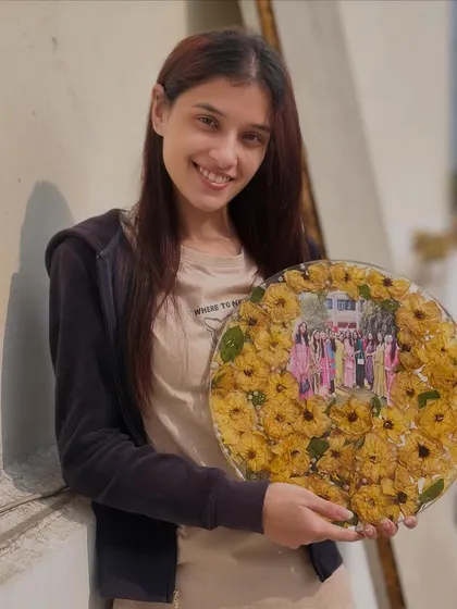 Yellow roses and love from all your friends will now be with you forever. Here I am, holding a finished frame preserving a special photo with friends.
