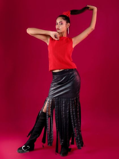 A playful and energetic pose that captures a moment of movement and fun.